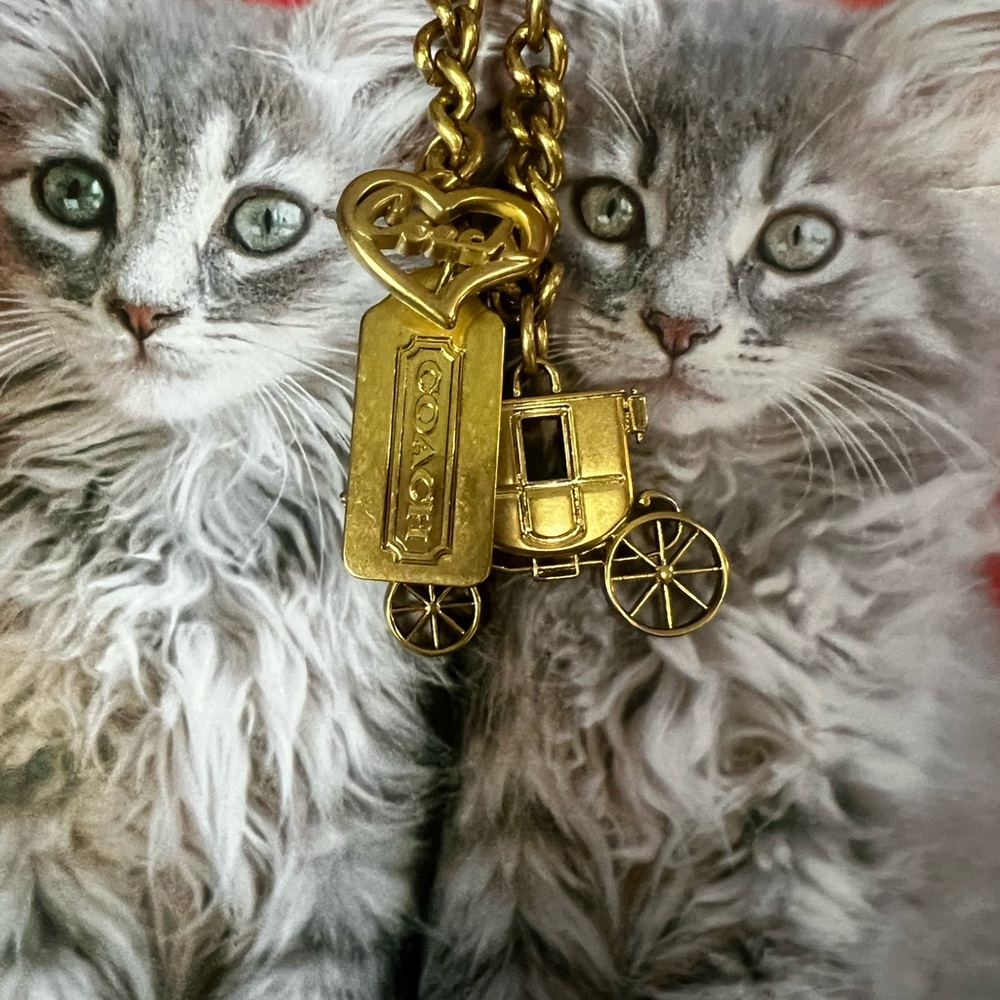 Hard to find Coach Gold Carriage Keychain with Heart and tag Charm